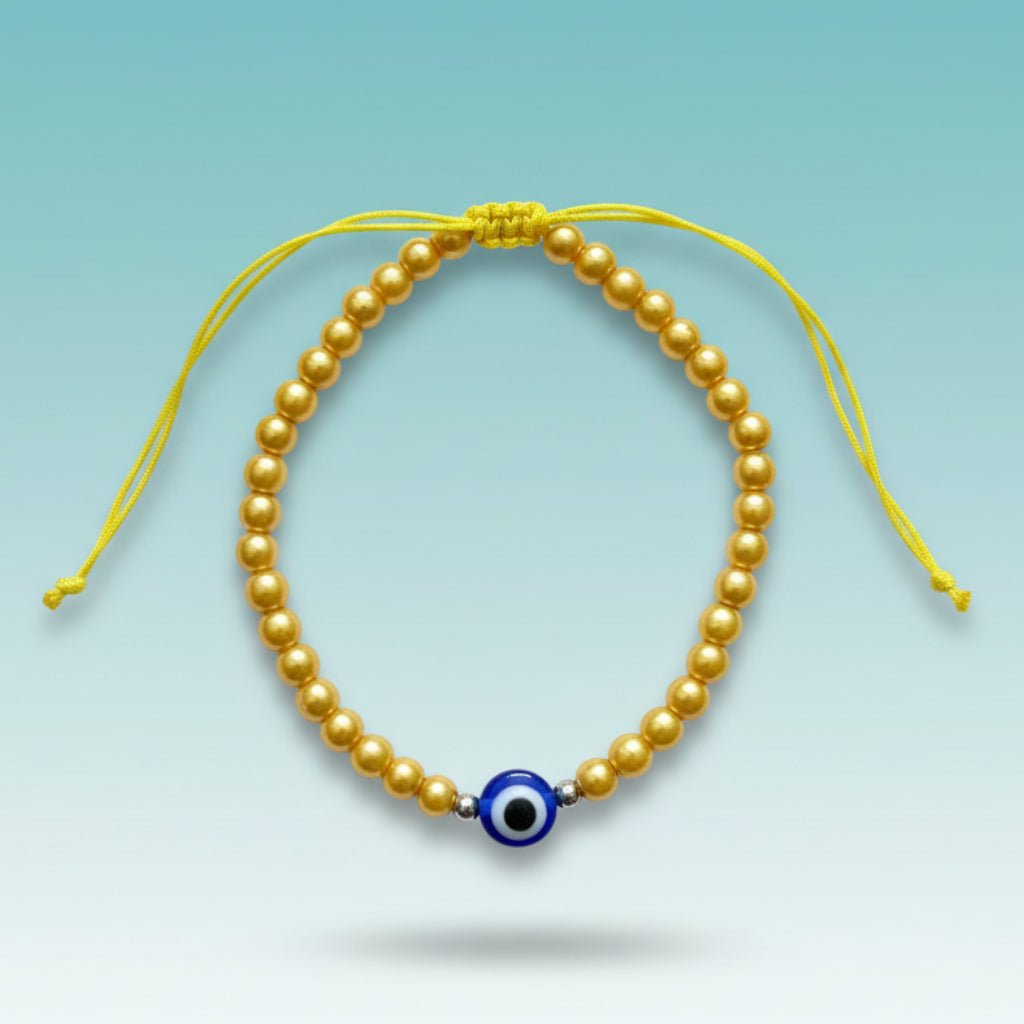 Evil Eye With Beads Bracelet featuring gold-tone faux pearls, a protective blue evil eye charm, and a yellow string closure.