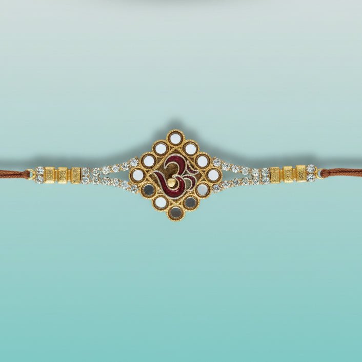 Gift Hub Mart Meenakari Om Rakhi – gold-toned bracelet with enamel Om centerpiece and brown tassels