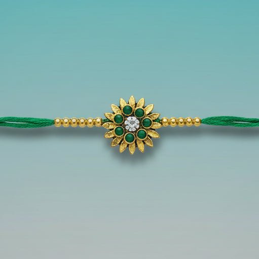 Gifthubmart Yellow Green Red Flower Rakhi with green thread and gold-tone floral centerpiece