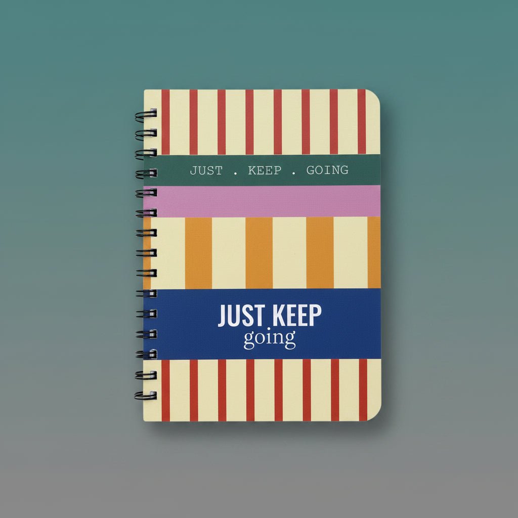 Sundaram A5 spiral notebook Just Keep Going with a colorful striped cover