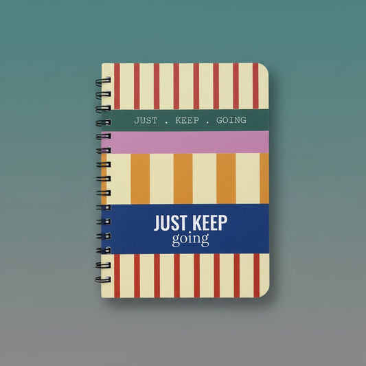 Sundaram A5 spiral notebook Just Keep Going with a colorful striped cover