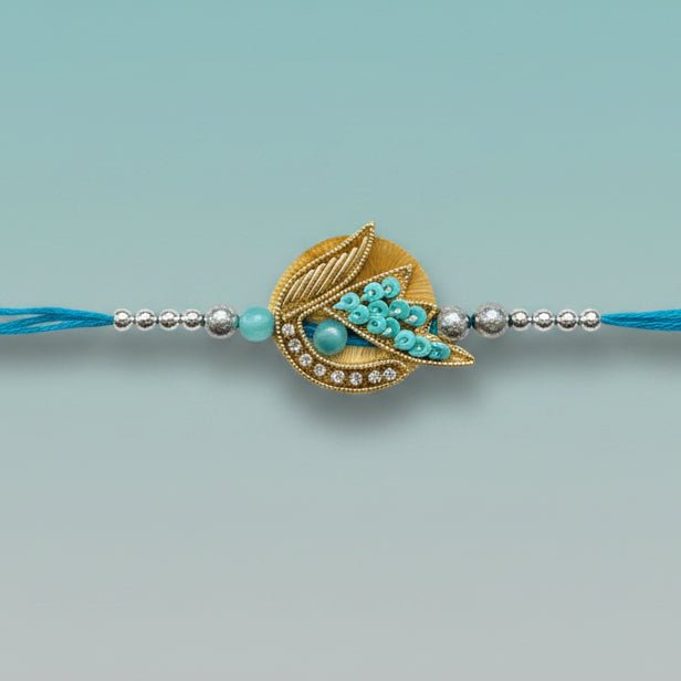 Blue Tara & Stone Rakhi from Gifthubmart with turquoise beads and crystal pendant on blue thread