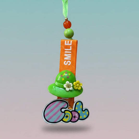 Gifthubmart Cool Rakhi Lumbi with orange and green beads, orange strap and floral embellishment