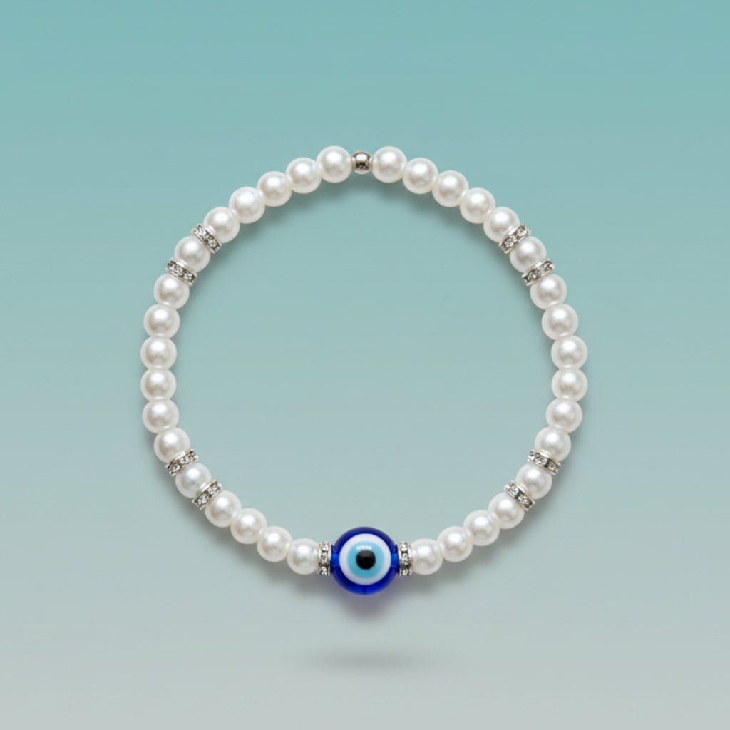 Evil Eye With Beads Bracelet featuring white faux pearls, silver-tone rhinestone spacers, and a protective blue evil eye charm.
