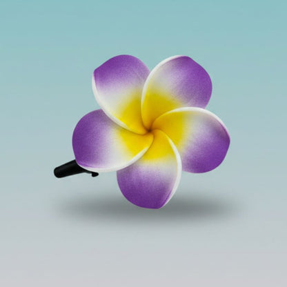 Flower-shaped hair clip with purple and yellow petals 