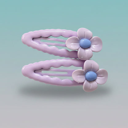 Gift Hub Mart Flowers Tic Tac Clips – assorted lavender flower hair clips in a clear pack