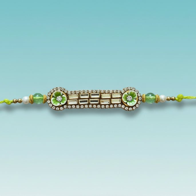 Green Stone Rakhi by Gifthubmart with gold-toned centerpiece and green beads