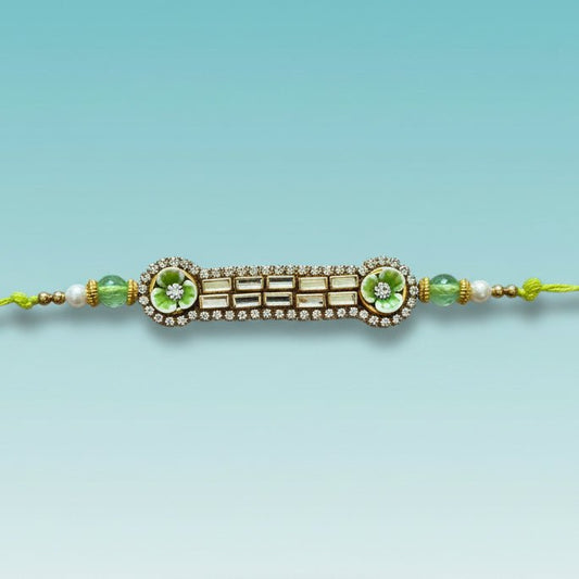 Green Stone Rakhi by Gifthubmart with gold-toned centerpiece and green beads