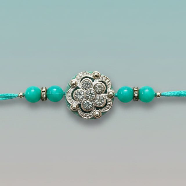 Gifthubmart Green Stone Rakhi 2 with turquoise beads and ornate silver centerpiece