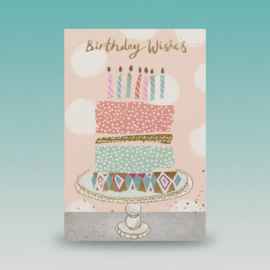 Greeting card by Gift Hub Mart - Birthday Wishes design with pastel candles and dotted cake illustration.