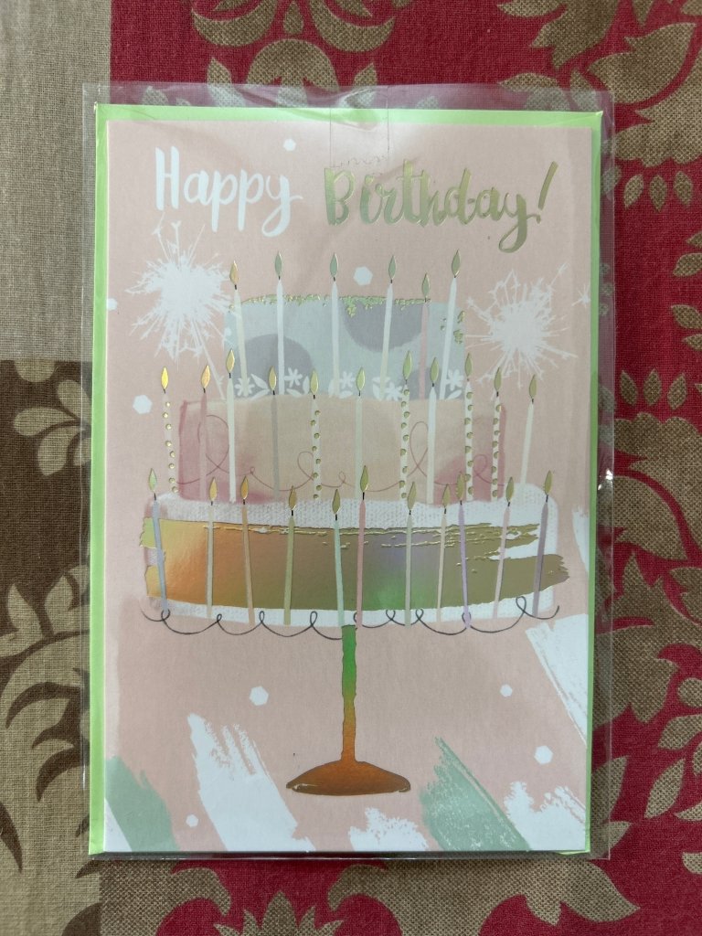 Greeting Cards by Gift Hub Mart: pastel pink birthday card with candle-lit cake design and neon green border.