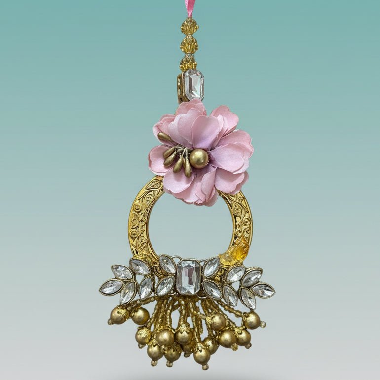 Gulab Ghunghru BB Rakhi by Gifthubmart with pink fabric flower and crystal-studded pendant