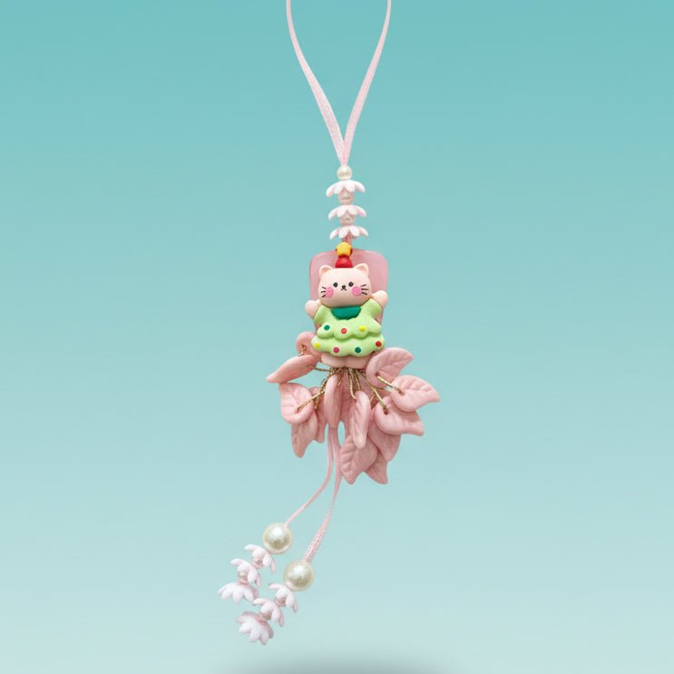 Hello Kitty Girls Lumbi by Gifthubmart, pink ribbon charm with pearl beads and pastel pink tassel.