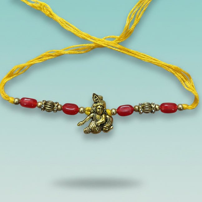 Gifthubmart Makahanchor Sadi Rakhi with yellow thread, red beads and brass deity charm