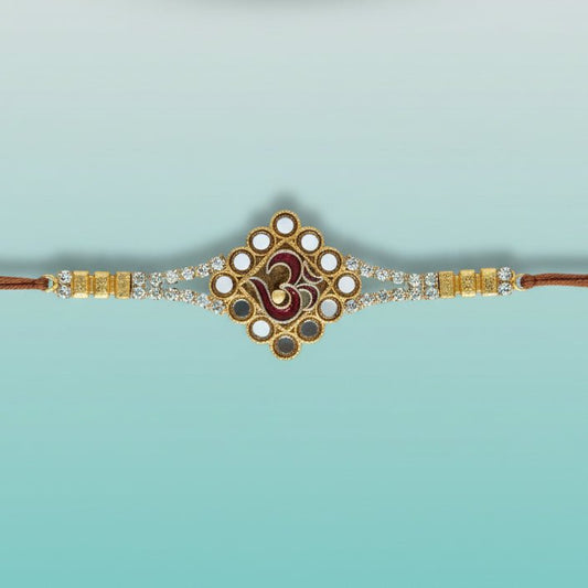 Gift Hub Mart Meenakari Om Rakhi – gold-toned bracelet with enamel Om centerpiece and brown tassels