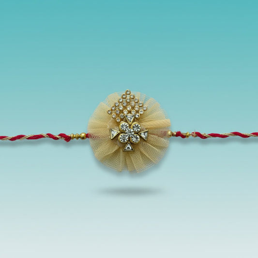 Net With Stone Rakhi by Gift Hub Mart on red-gold thread with crystal stones centerpiece