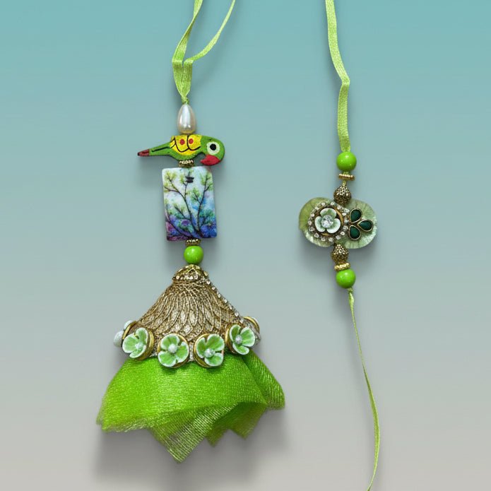 Parrot Green Bb Rakhi pair from Gifthubmart with green ribbons and decorative pendants