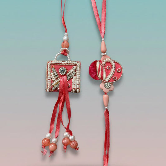 Gifthubmart Peach Purse BB Rakhi set – two peach pendants with pearl beads on red cords.