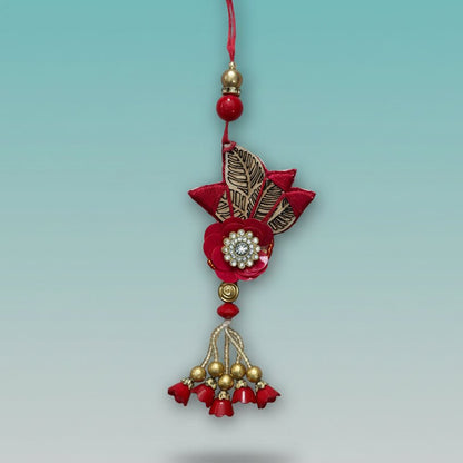 Red MDF BB Rakhi by Gifthubmart, leaf-motif pendant with red thread and rhinestone center