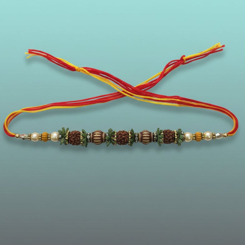 Rudraksh Sadi Rakhi 25A by Gifthubmart, beaded rakhi with red and yellow thread