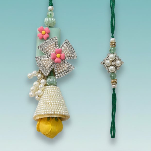 Gifthubmart White Pearls And Stones BB Rakhi with green thread and pink flower accents