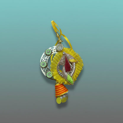 Yellow BB Rakhi by Gifthubmart with crystal-studded pendant and yellow ribbon