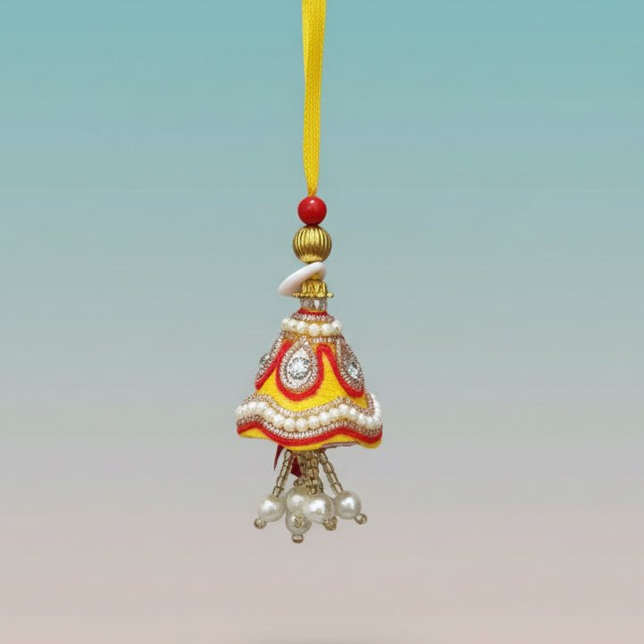 Gifthubmart Yellow Lumba ornament with yellow ribbon and pearl bead detailing